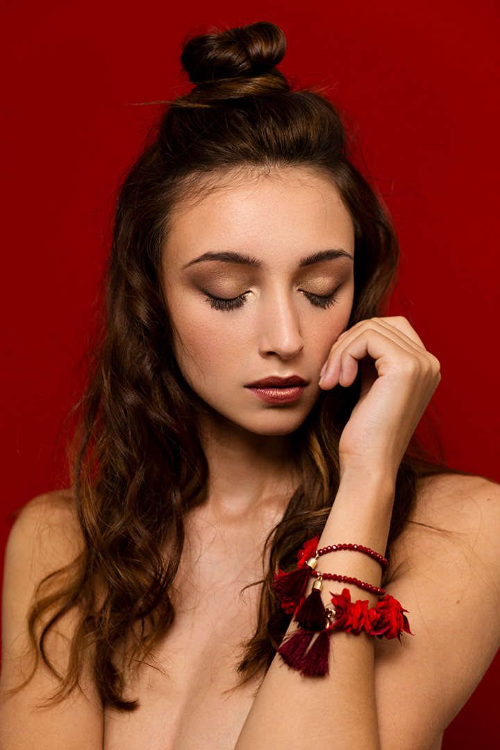 woman with floral jewels