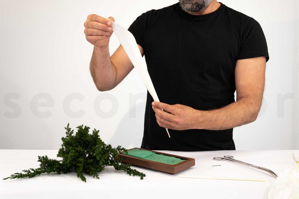 labotanica design arbeitet mit Aspidistra-Blättern und Wacholder
